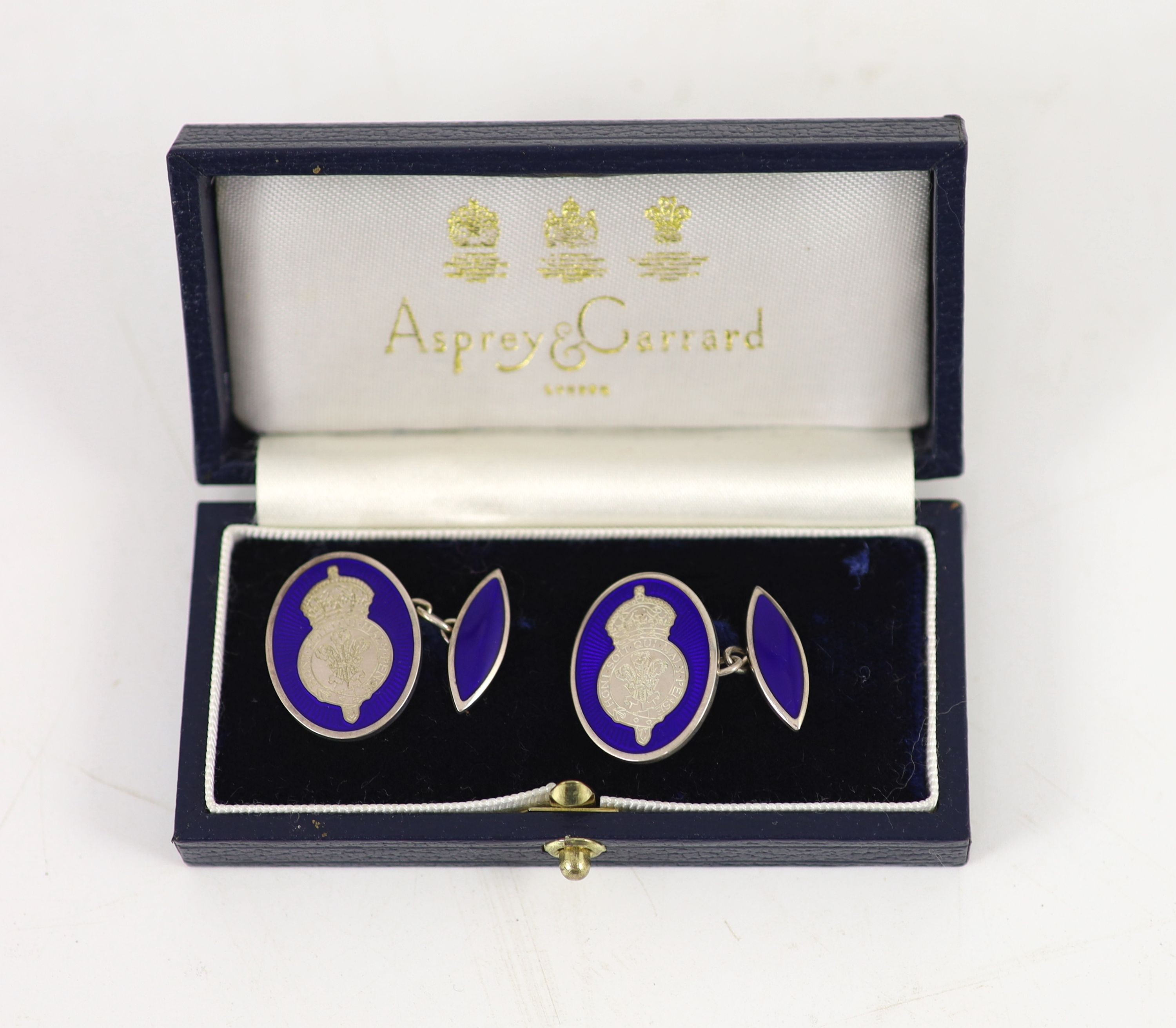 A pair of Asprey and Garrard silver and blue enamel ‘’Prince of Wales’’ presentation cufflinks, London, 1998.